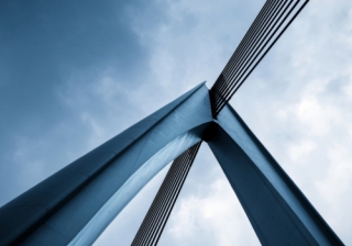 large metal and steel wire bridge support structure