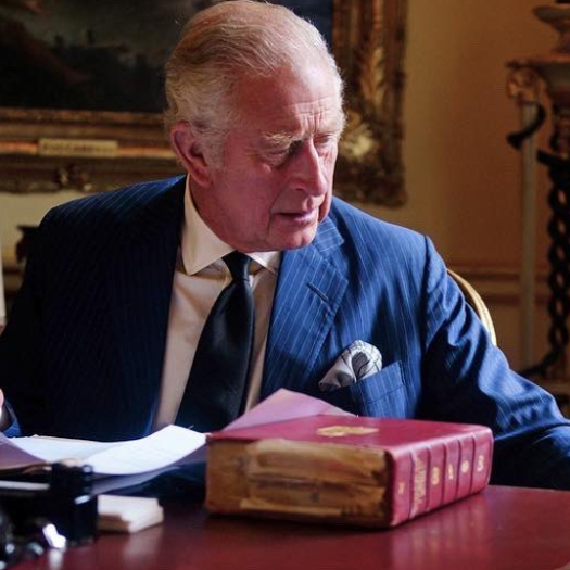 King Charles III at his desk