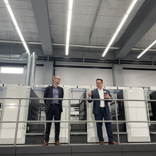 (L-R) Komori's Craig Bretherton and Ulrich Sause at the open house yesterday